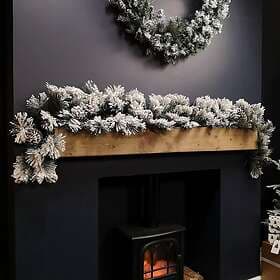 Samuel Alexander Christmas Snow Flocked Green Garland with Pine Cones 1.8m